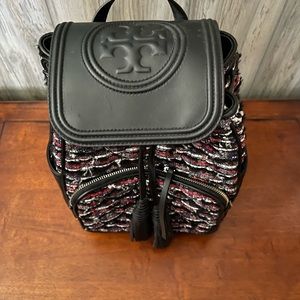 Tory Burch BP. 9” across at bottom and 11” high.